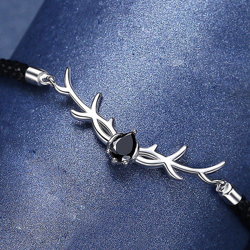 Silberarmband Hirschzauber Weiß und Schwarz
