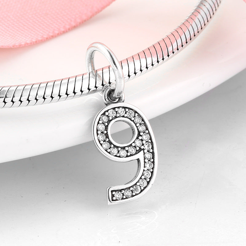 Zahlen Charms 9